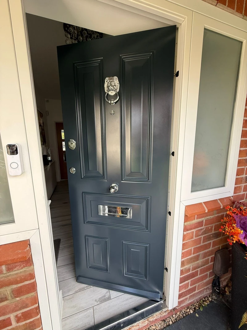 Navy blue front door with lion knocker - professional respray
