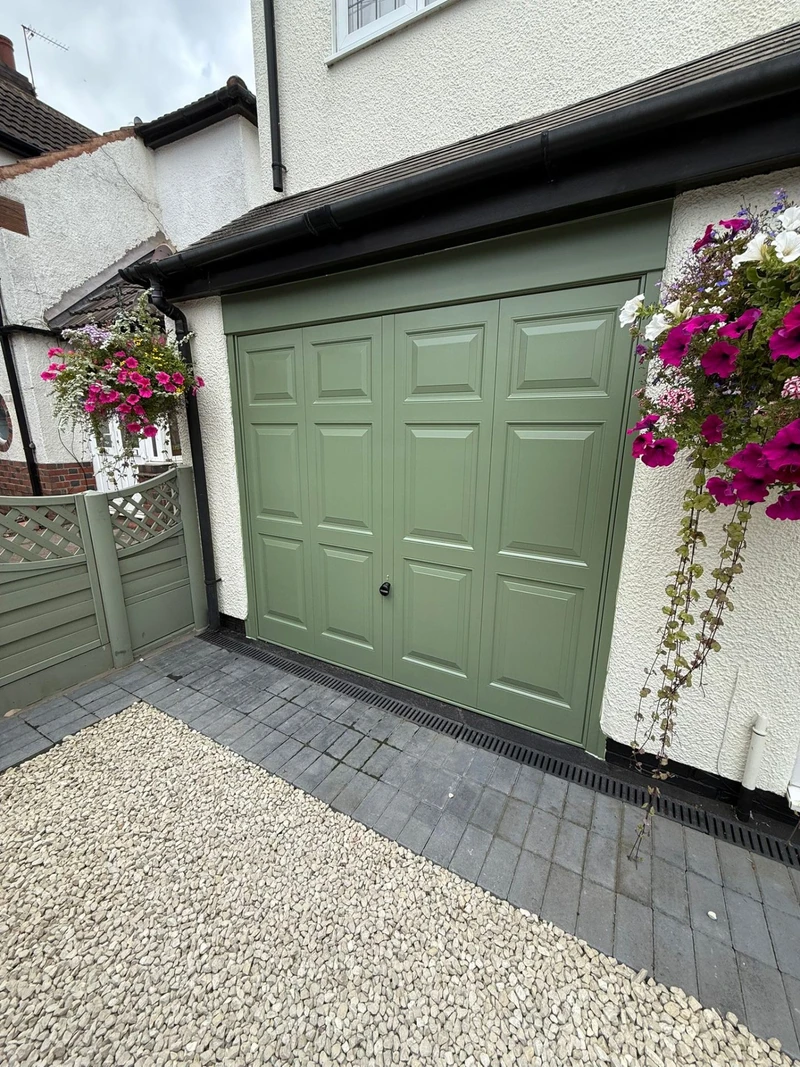 Sage green panel garage door respray by Spray Genius in Sutton Coldfield - weather-resistant finish
