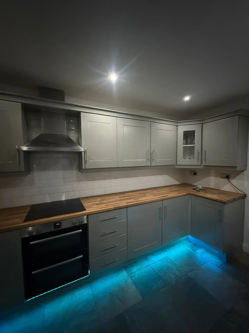 Modern grey kitchen with LED lighting - cabinet respray